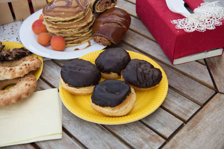 sweets on a table in the gardenの写真素材