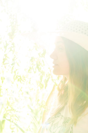 young girl in a hat