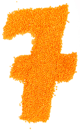numbers of yellow lentils on a white backgroundの写真素材