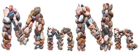 A letter of smooth stones on a white isolated background. Of the river stones lined with a letter, detailing, close-up. selective focus.の写真素材