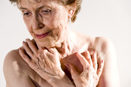 Senior woman in her 70s with wrinkled skin