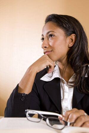 Young African-American female university student thinking and smilingの写真素材