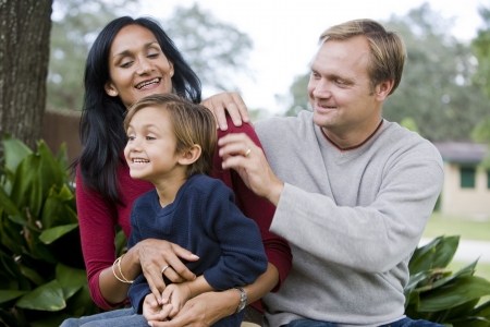 Indian mother and Caucasian father with cute mixed-race five year old sonの写真素材
