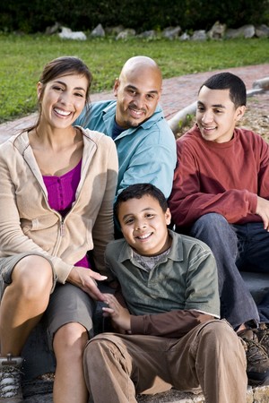 Portrait of Hispanic family with two boys outdoorsの写真素材