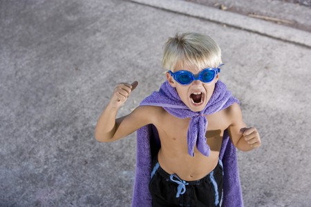 Cute boy, 7 years, in pretend superhero costumeの写真素材