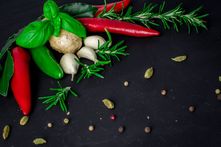 photo of red peppers and herbs