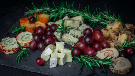 cheese assortment on boardの写真素材