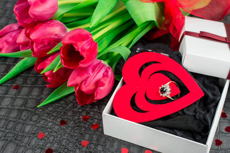 sexy background with pink tulips and  black  knickersの写真素材