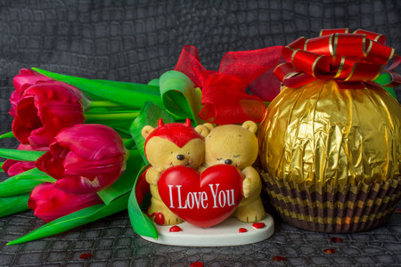 pink tulips on sexy background with teddy bears valentine background