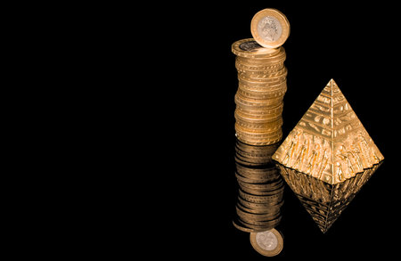gold pyramid and coins