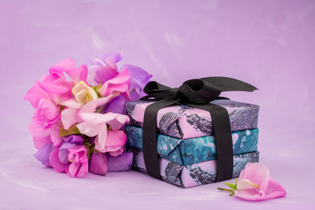 beautiful sweet peas flowers on pink background