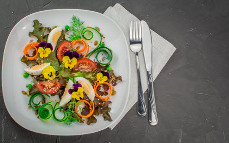 healthy food ,fresh home made salad with edible flowersの写真素材