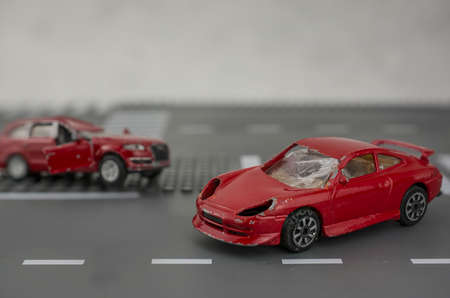 Two cars accident crash on road  insurance case, broken toys carの写真素材