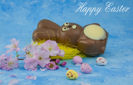 easter background chocolate easter eggs with pink flowers