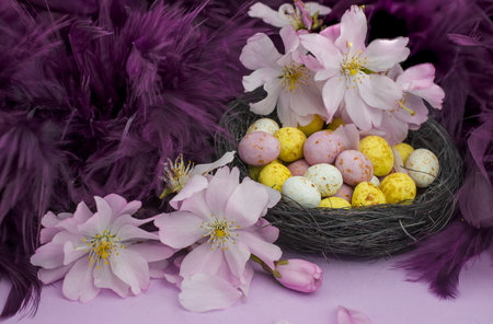easter background chocolate easter eggs with pink flowers