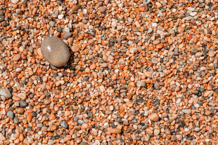 Colorful sea stones background. Colorful pebbles textureの写真素材