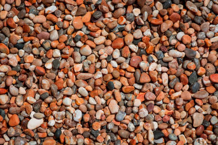 Colorful sea stones background. Colorful pebbles textureの写真素材