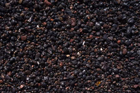 Close-up picture of the vulcanic black sandの写真素材