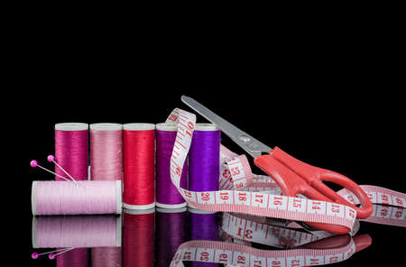 Colourful sewing threads background closeupの写真素材