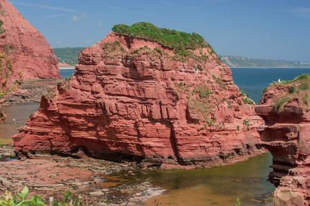 red sandstones of the Ladram bay on the English Channel coastの写真素材