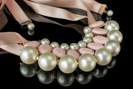 Romantic beautiful pendant on black backgroundの写真素材