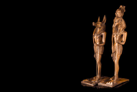 Ancient Egyptian statue on the black backgroundの写真素材