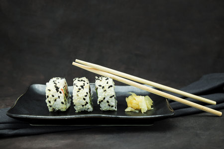 A set of delicious sushi on dark backgroundの写真素材