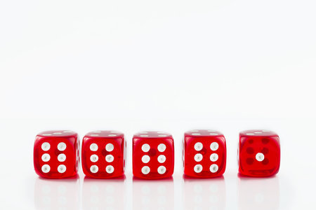 photo of red casino dice on white background