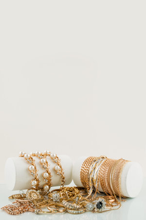 Old and broken scrap gold metal jewellery on  backgroundの写真素材