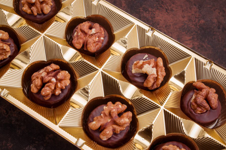 Box of chocolates with nuts in the form of a heartの写真素材