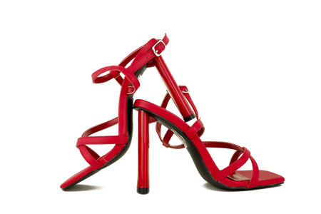 Red high heel women shoes isolated on white background, clipping path includedの写真素材