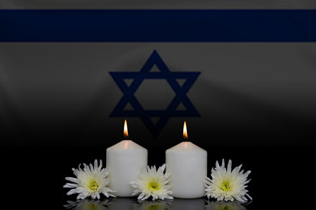 Candles with Israel Flag on a black background. Memorial Day.の写真素材