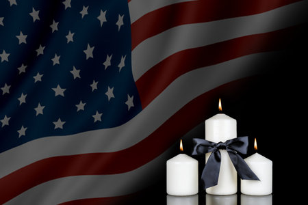3d rendering of american flag with black ribbon and burning candlesの写真素材