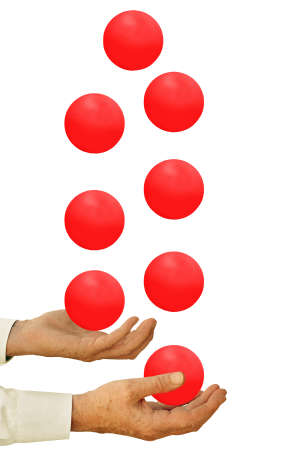 Businessman juggling - priorities, time management conceptの写真素材