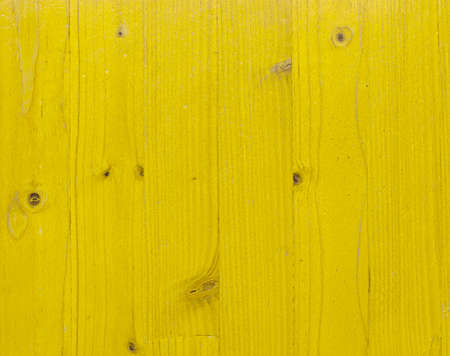 Stained varnished yellow wood on construction siteの写真素材