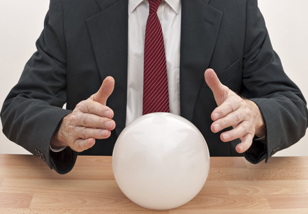 Businessman with crystal ball - conceptの写真素材
