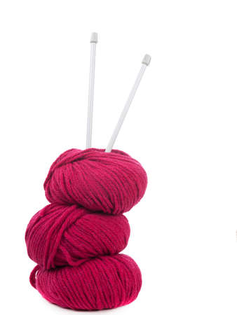 Pink wool, yarn and knitting needlesの写真素材