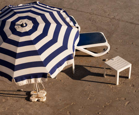 No beach - no worry - urban sunbather improvises using concrete blockの写真素材