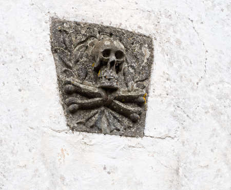 Stone carved skull and crossbonesの写真素材