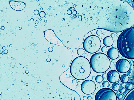 Oil and water macro, science background.の写真素材