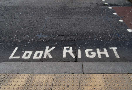Look right road warning, danger sign. Political metaphor maybe.の写真素材