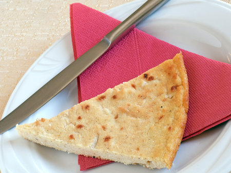 Home made slice of Barbotta, savoury pie from Lunigiana, Italy.の写真素材