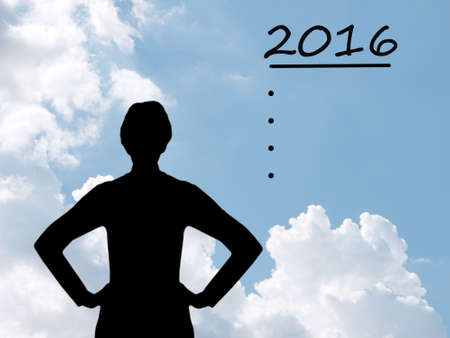 Strong woman silhouette with aim, ambitions to New Year 2016の写真素材