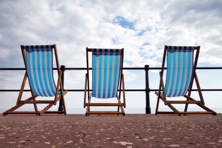 Ocean view. Two deckchairs. Sidmouth, Devon, UK.の写真素材