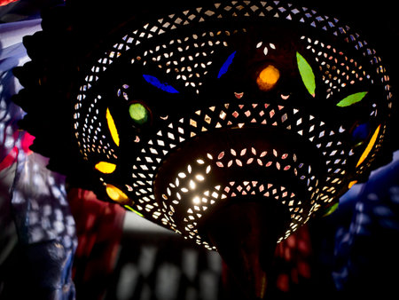 Moroccan lamp indoors. Hints at interior behind.の写真素材