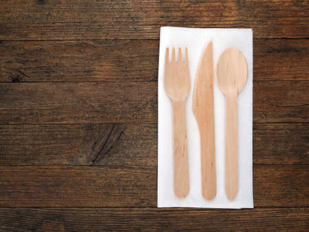 Ecological disposable cutlery. With white paper napkin.の写真素材