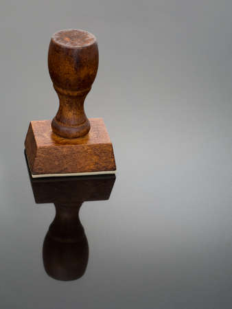 Rubber stamp, wood, reflected. Approval, rejection business concept.の写真素材