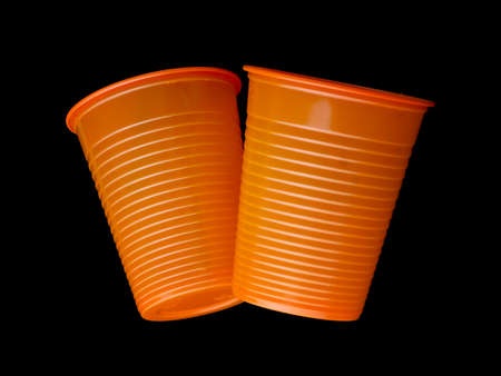 Traditional design plastic cups, disposable, bright orange..の写真素材