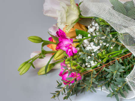 Floral gift. Bouquet of mixed flowers with copy space.の写真素材