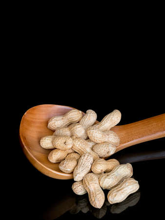 Peanuts in shells aka monkey nuts. With copy space.の写真素材